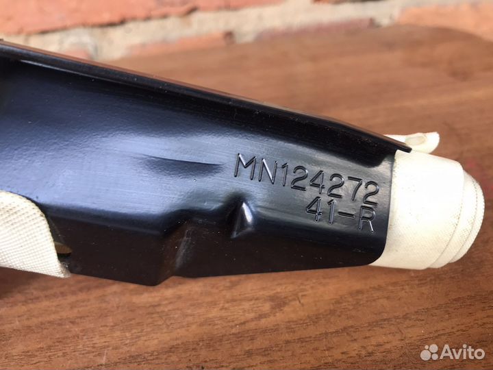 Шторка безопасности правая Mitsubishi Lancer 9