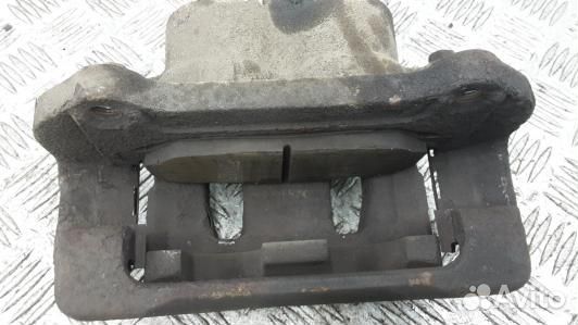 Суппорт тормозной передний левый KIA sorento 2 (ZA