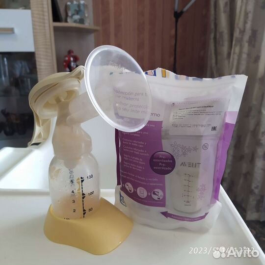 Молокоотсос medela ручной