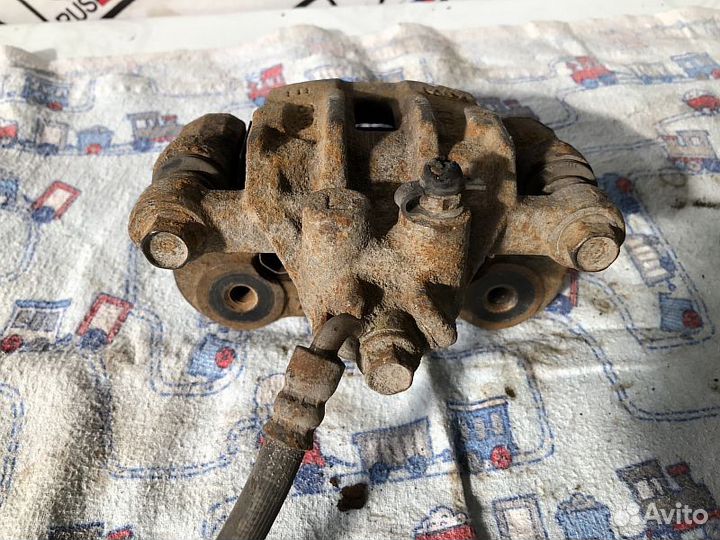 Суппорт тормозной задний левый Kia Ceed 2007