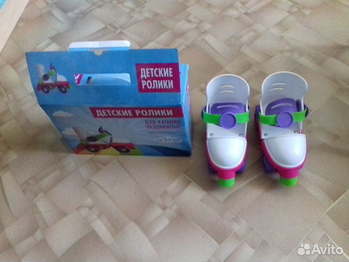 Коньки роликовые