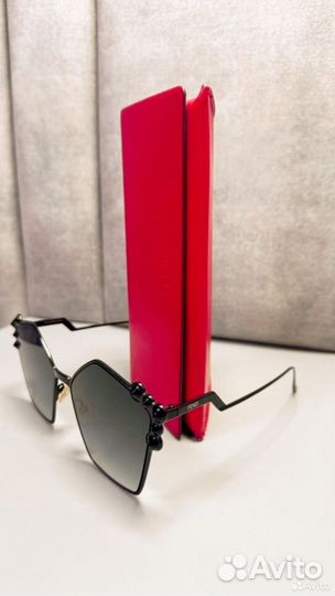 Солнечные очки женские