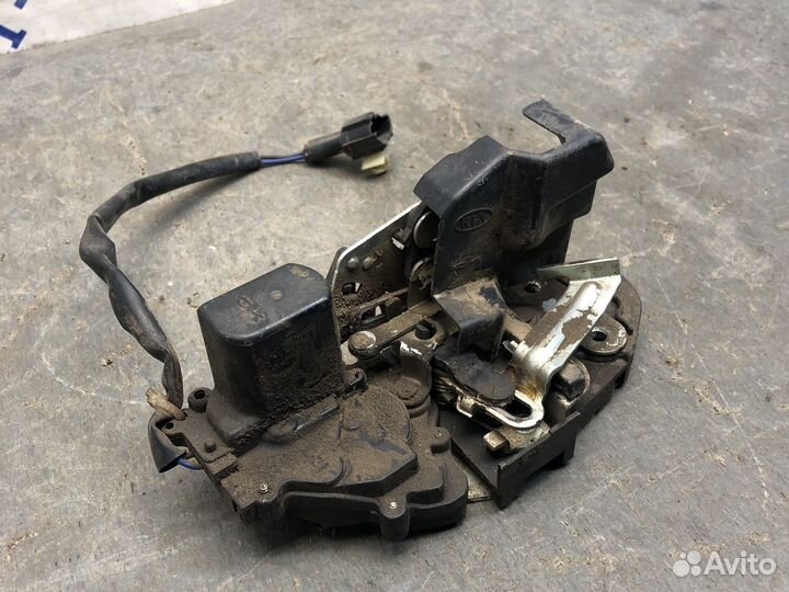 Замок двери зад лев Kia Spectra