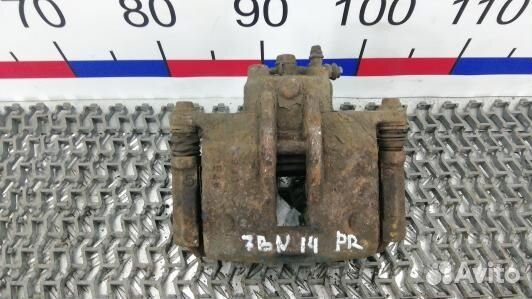 Суппорт тормозной передний правый toyota corolla E