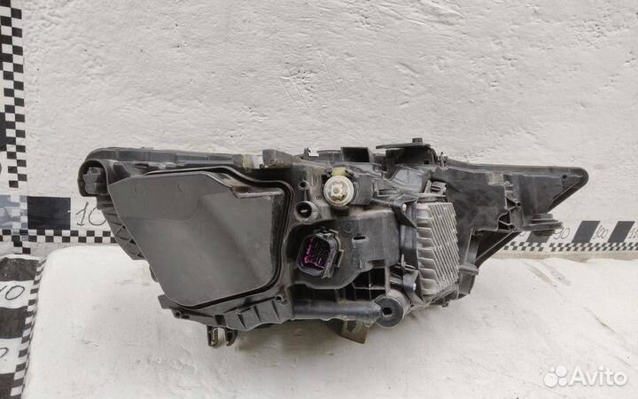 Фара левая Audi A6 allroad quattro