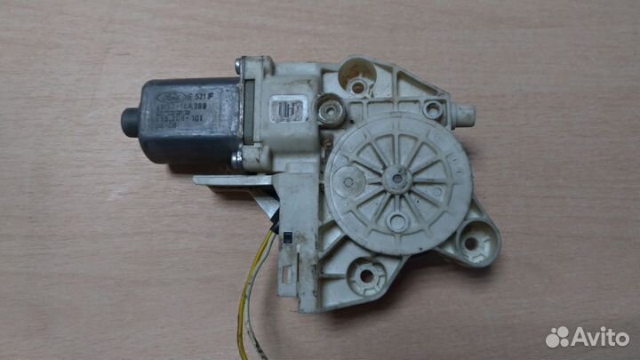 Моторчик стеклоподъёмника передний левый Ford