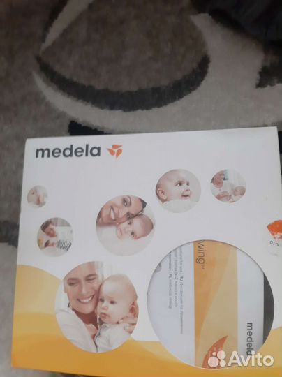Молокоотсос medela swing электрический