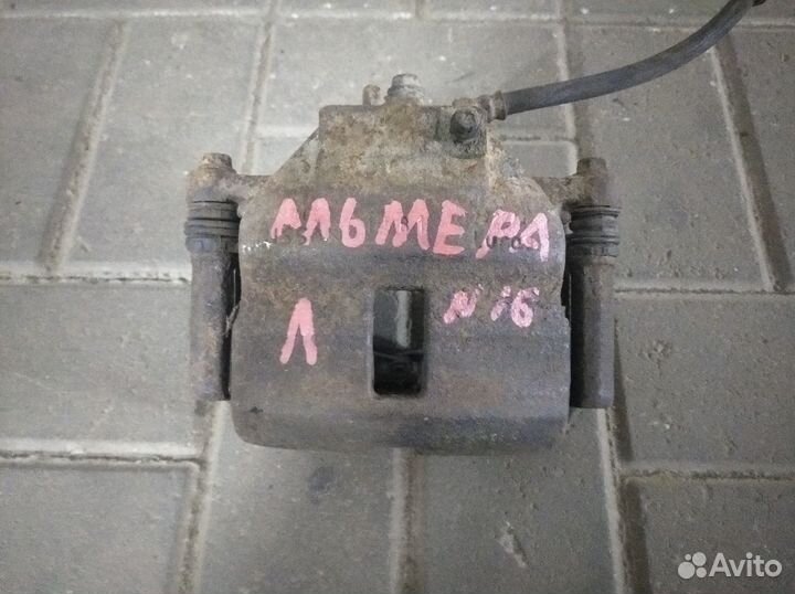 Суппортf тормозные передние Nissan Almera n16