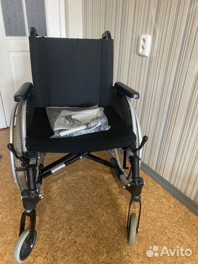 Инвалидная коляска