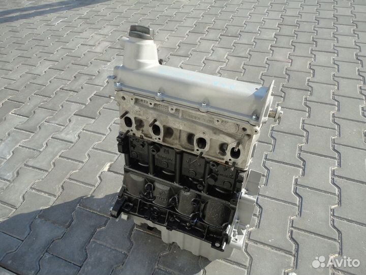 Ат) Двигатель VW t5 AXA