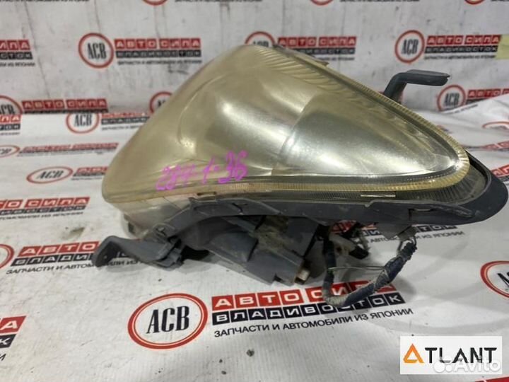 Фара левая toyota IST