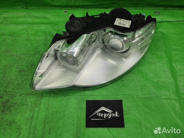 Фара левая рестайлинг адаптив VW Touareg 07-10