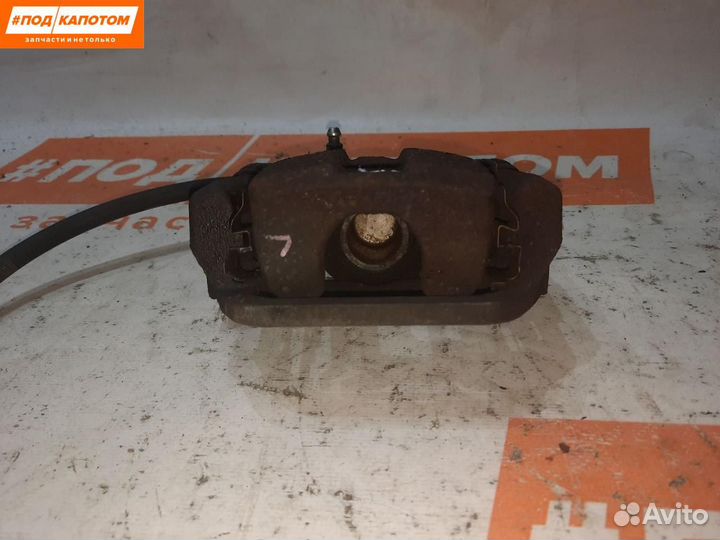 Суппорт тормозной задний левый Nissan X-Trail T31