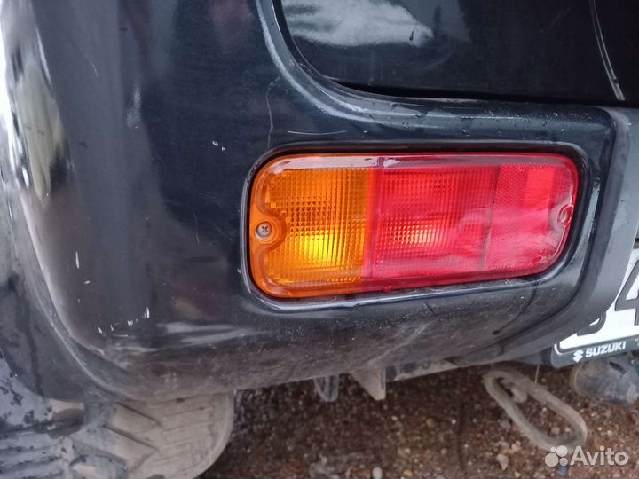 Поворотник бамперный левый Suzuki Jimny