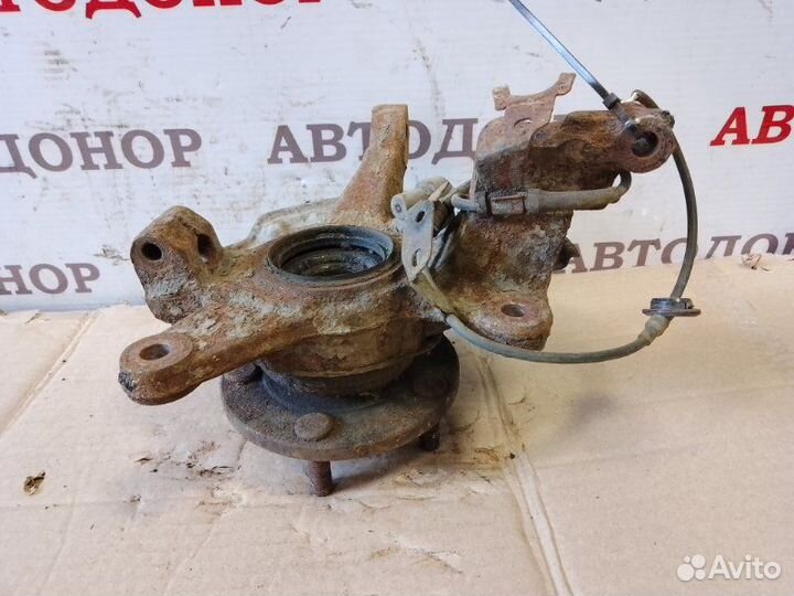 Поворотный кулак передний левый Mazda 626 GE