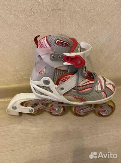 Роликовые коньки