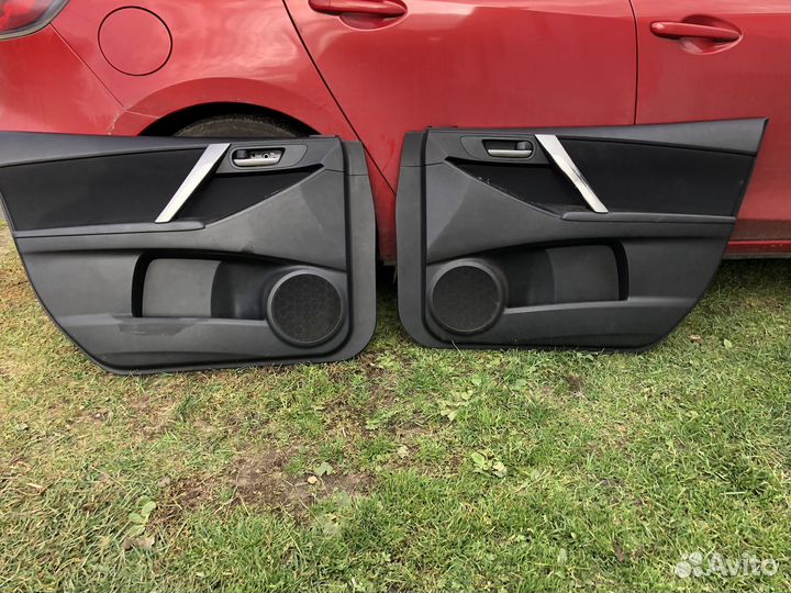 Обшивки двери Mazda 3 BL