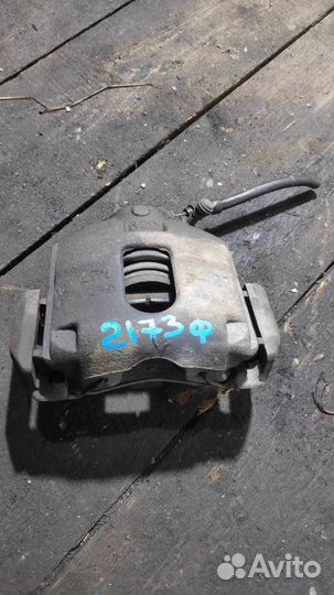 Суппорт тормозной передний левый Ford Fusion