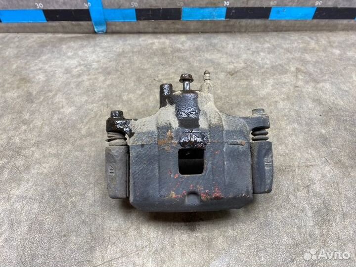 Суппорт передний левый Mitsubishi Lancer 10 1.6