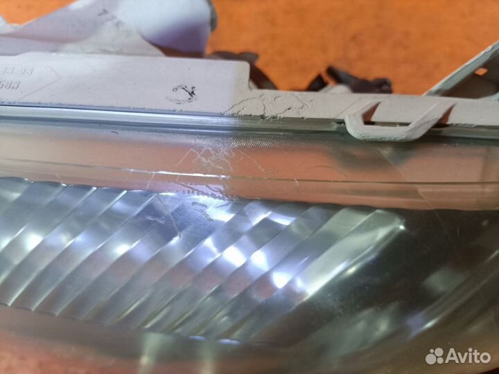 Фара левая Toyota Corolla fielder NZE144G