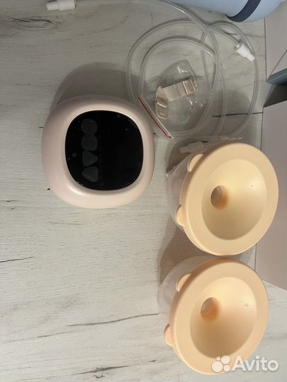 Молокоотсос портативный электрический