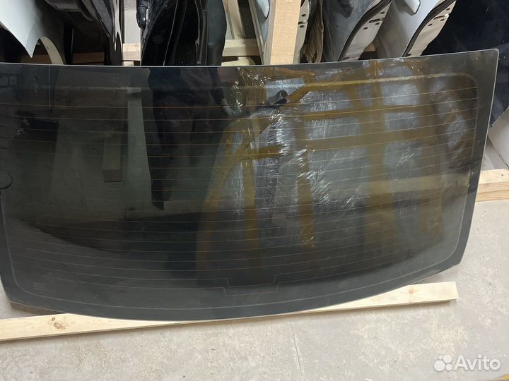 Заднее стекло Рено Логан 1