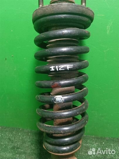 Стойка амортизатора передняя левая Ssangyong Rext