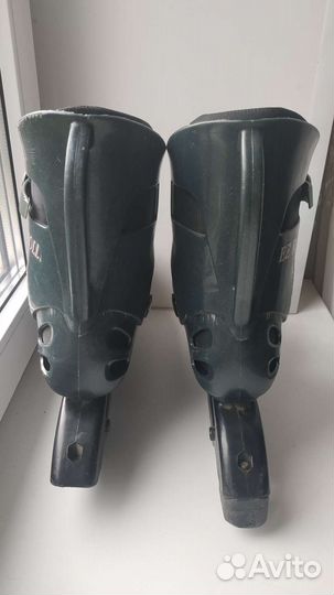 Роликовые коньки