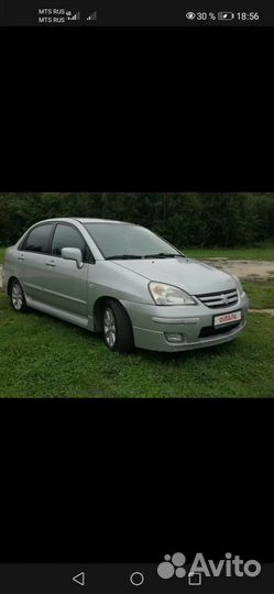 Дверь левая задняя зузуки лиана седан