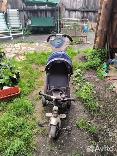 Трехколесный велосипед-коляска