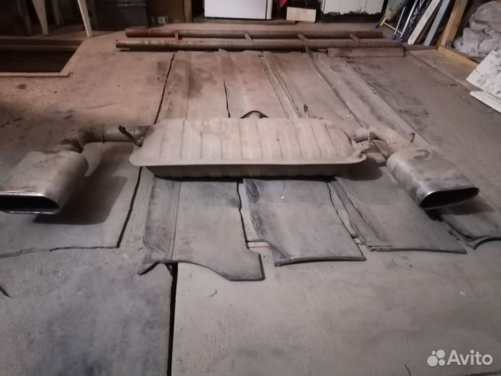 Бампер lancer 10 с выхлопной системой