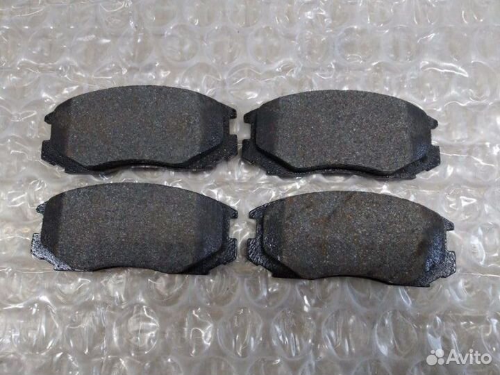 Колодки дисковые передние Mitsubishi Lancer