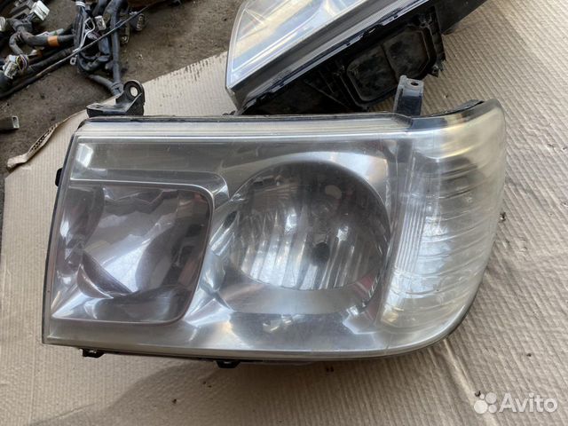 Фара передняя Toyota Land Cruiser 100