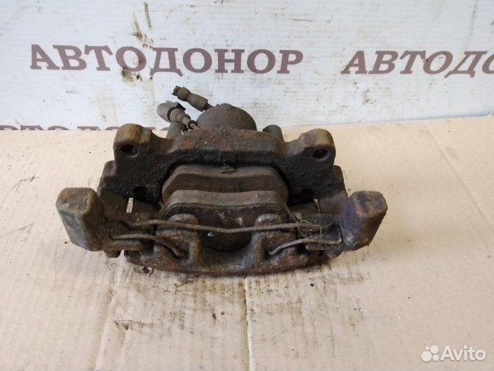 Суппорт тормозной передний правый Volkswagen