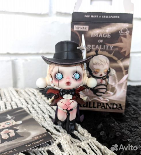 Фигурка Scullpanda pop mart
