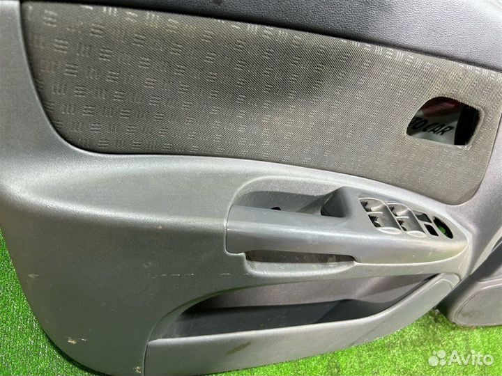 Обшивка двери передняя Kia Rio 2 JB G4EE 2006