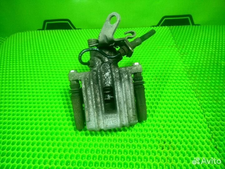 Суппорт задний левый Skoda Octavia II A5