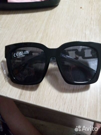 Солнцезащитные очки женские брендовые