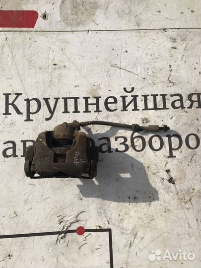 Суппорт тормозной передний левый Land Rover Freela