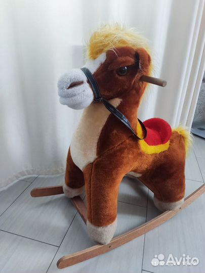 Конь качалка