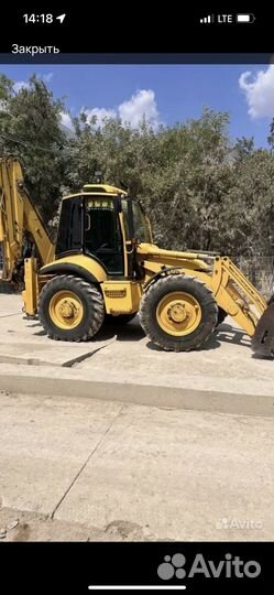 Экскаватор-погрузчик Komatsu WB97S-2, 2001