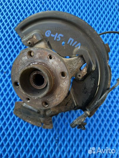 Поворотный кулак левый с abs Nissan Almera G15