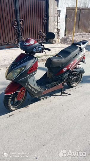 Скутер мопед