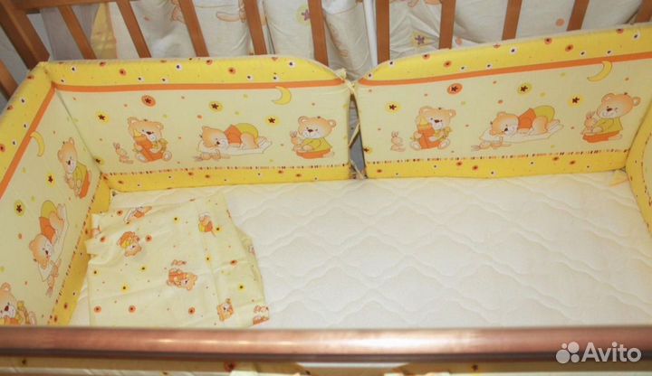 Детская кроватка с продольным маятником