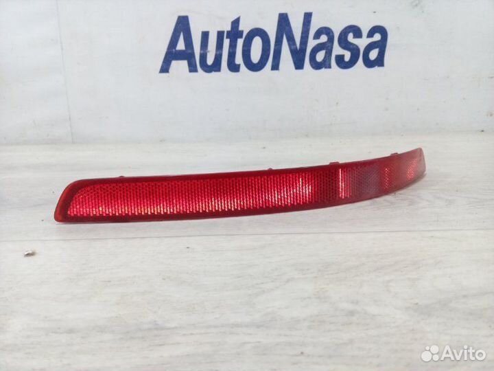 Отражатель в бампер задний левый Kia Rio 3 седан