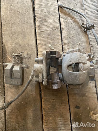 Тормозной суппорт передний рено меган 2