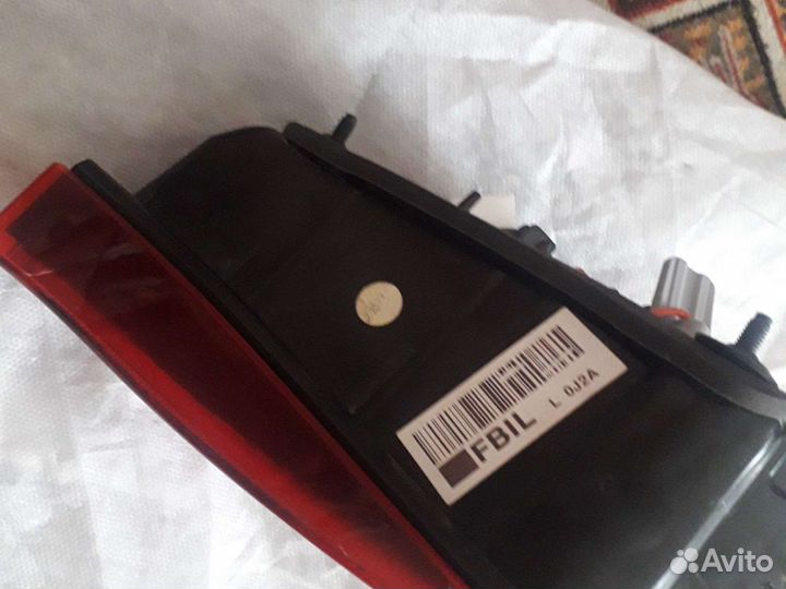 Kia Rio 4 фонарь левый в крышку багажника оригинал