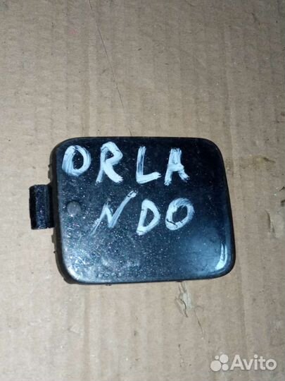 Chevrolet Orlando заглушка буксировочного Люка