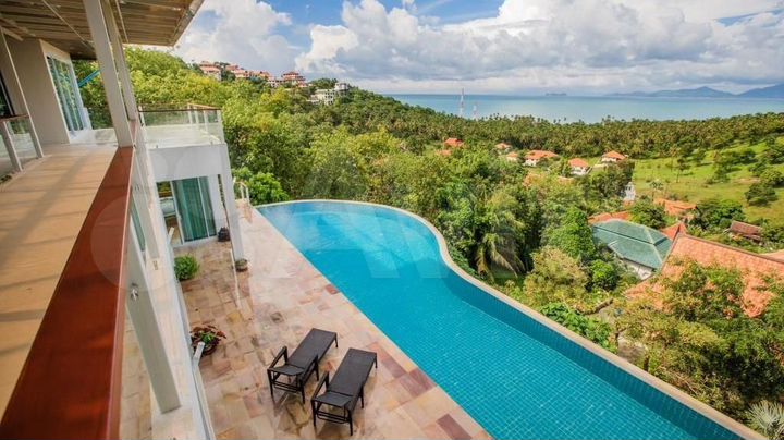 Коттедж 850 м² на участке 14 сот.