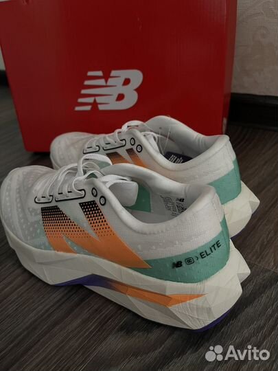 Беговые кроссовки New balance fuelcell elite v.4